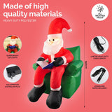 Christmas By Sas 1.9m Santa & His Reading Chair Self Inflating LED Lighting