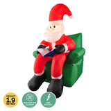 Christmas By Sas 1.9m Santa & His Reading Chair Self Inflating LED Lighting